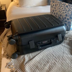 Solagaard rolling hardcover suitcase